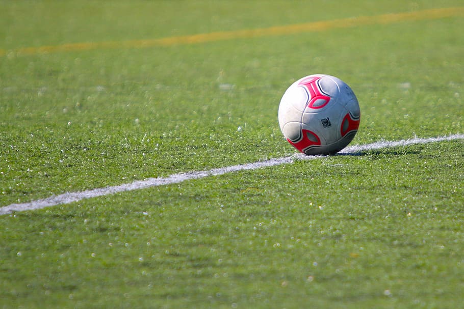 ball on field, playing field, grass, ball, line, football, center line, kick-off, sport, soccer