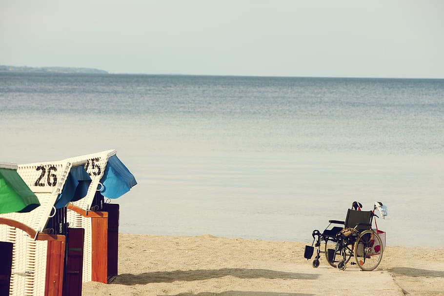 negro, orilla del mar, silla de ruedas, discapacidad, spa, discapacitados, rolli, locomoción, movilidad, discapacidad física