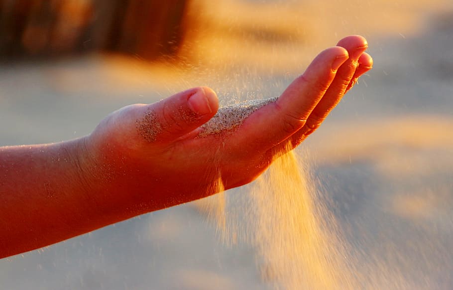 person, sand, hand, open, finger, rippling sand, sand trickling through fingers, evening light, abendstimmung, fine sand
