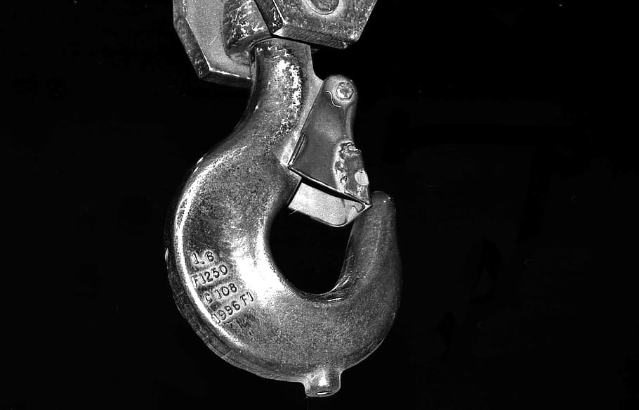 black and white, hook, crane, metal, close-up, still life, black background, indoors, single object, hand tool