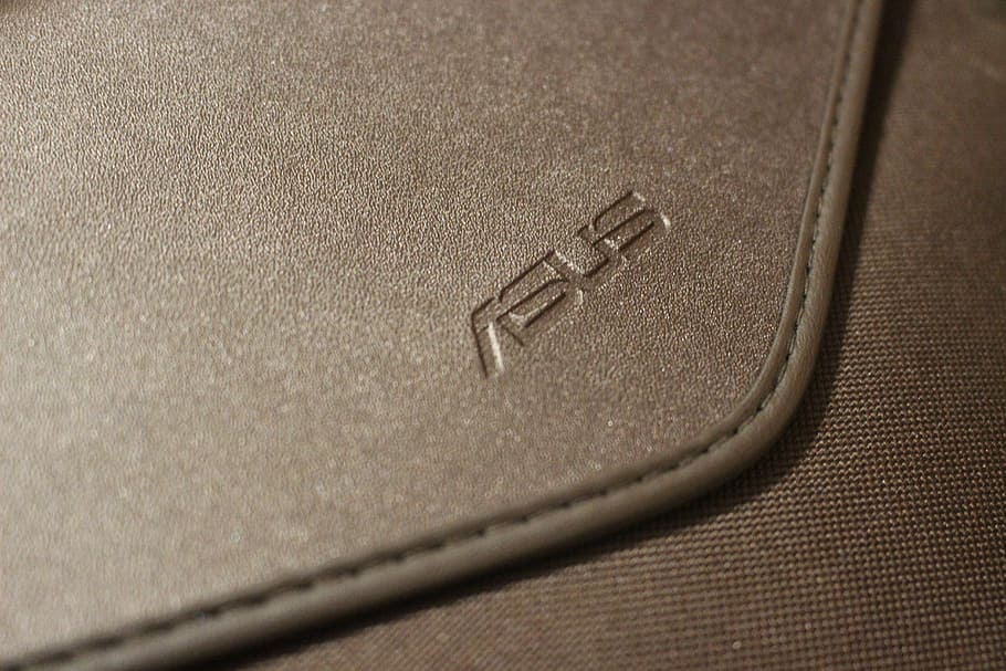 asus, brand, close-up, table, indoors, high angle view, selective focus, communication, business, backgrounds