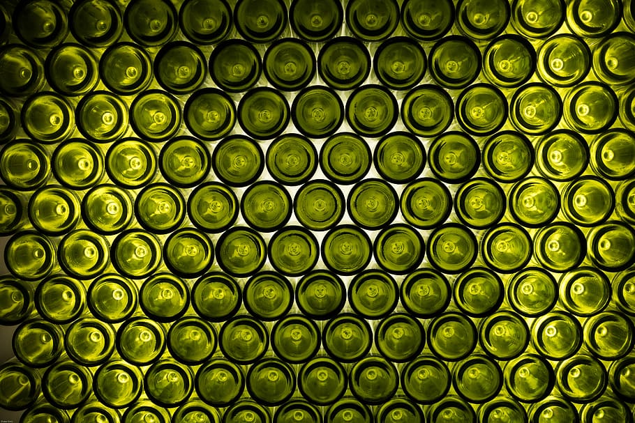 green, glass bottle stack, bottles, bottom of the bottle, wine, wine bottles, shelf, plays of light, shiny, full frame