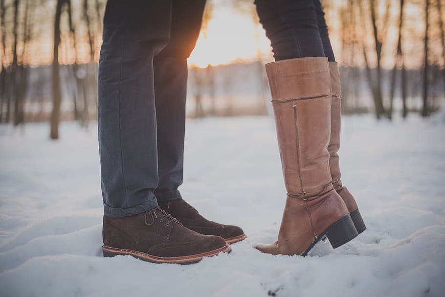 two, persons, standing, snow-covered, ground, kissing couple, man, feet, boots, snow