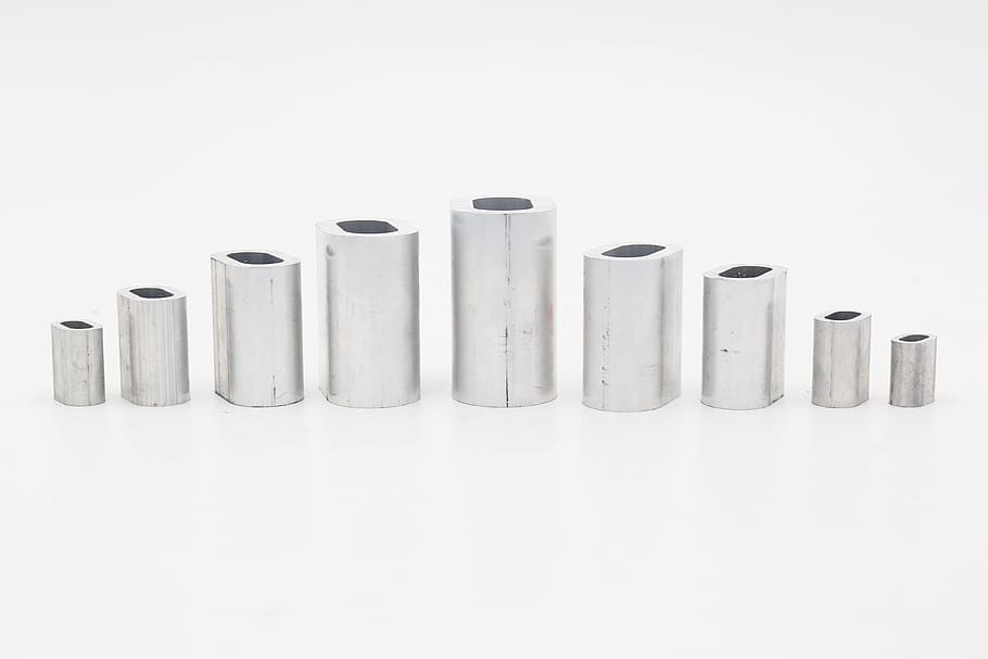 aluminum ferrule, en13411-3, klifting, sleeve, wire rope sling, group of objects, indoors, studio shot, white background, in a row