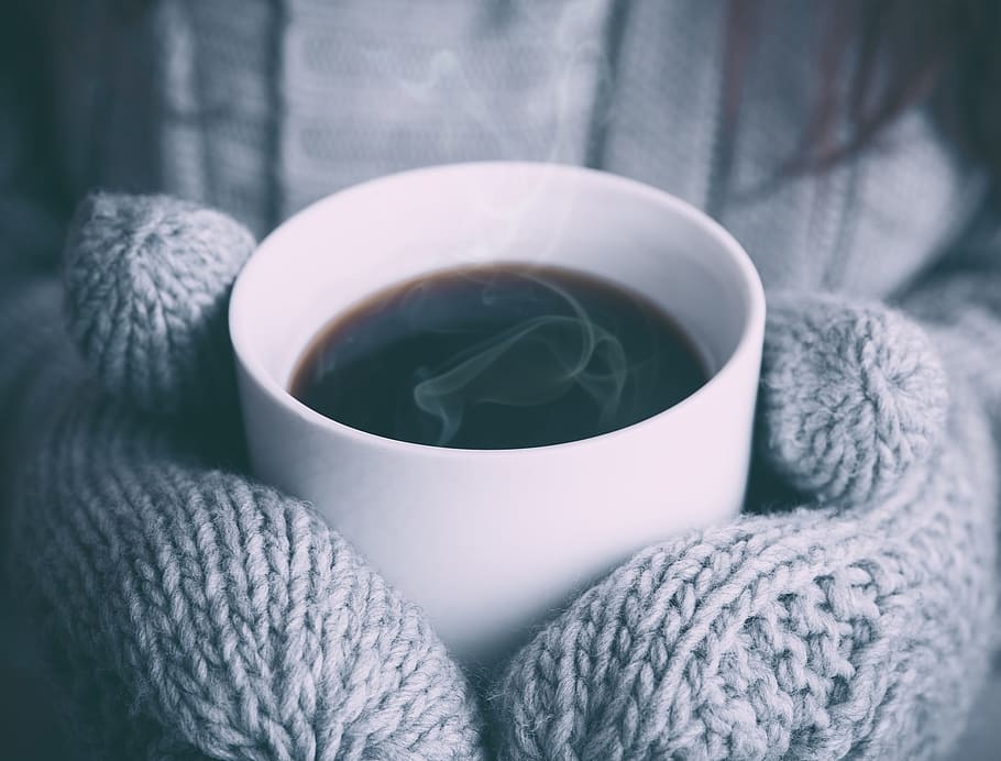 person, holding, ceramic, mug, coffe, coffee, steam, hot, mittens, mitts