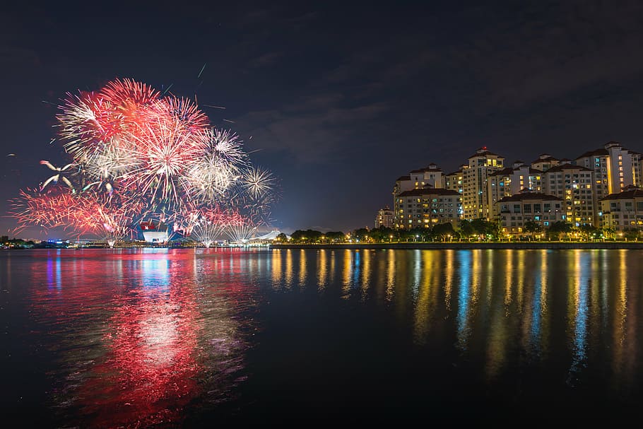 fireworks beside buildings, fireworks, display, near, city, urban, night, lights, buildings, structure