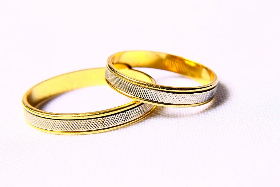 two, round gold-colored coins, alliances, bodas, silver wedding, commitment, union, marriage, gold, jewelry