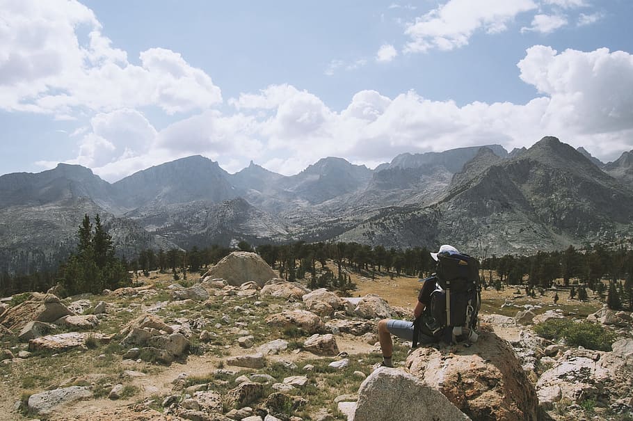 man, sitting, rock, trees, mountains, hiking, hike, trek, knapsack, backpack