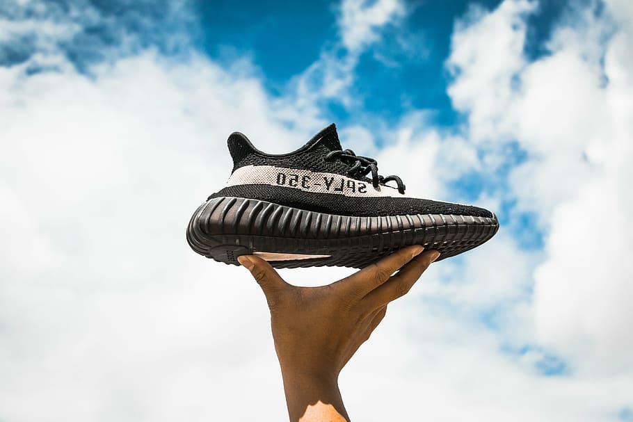 person, holding, black, white, adidas yeezy, boost, 350 v 2 shoe, v2, blue, sky