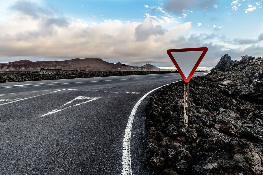 red, white, road signage, road, yield, junction, confluence, lanzarote, el golfo, sky