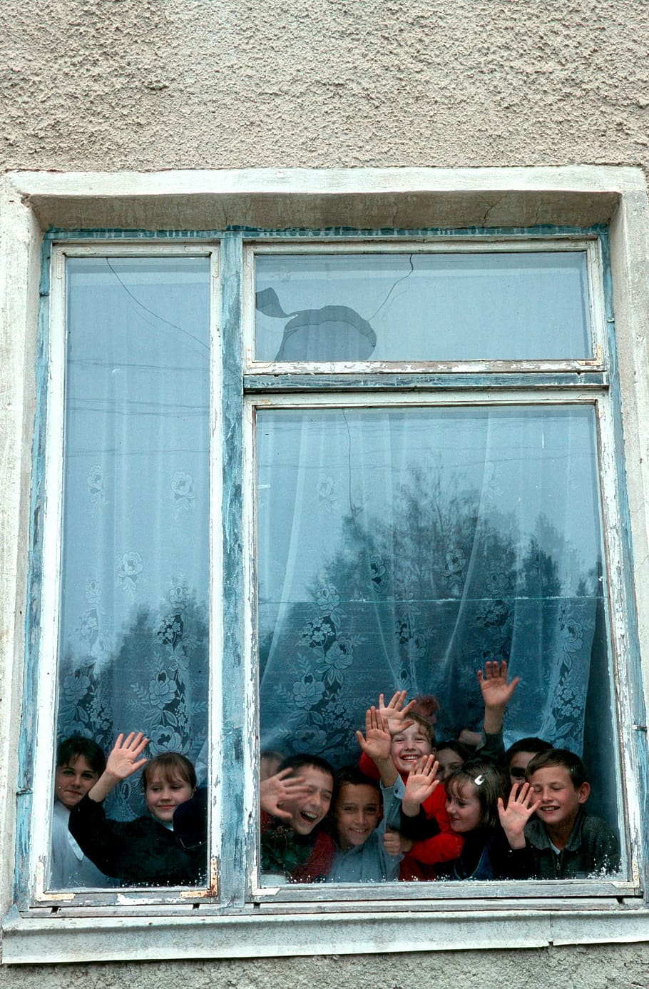 group, children, indoor, moldova, school, building, window, boys, girls, waving