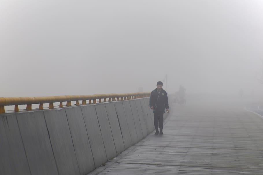 people, riverside, dam, along the river, fog, real people, one person, lifestyles, direction, full length