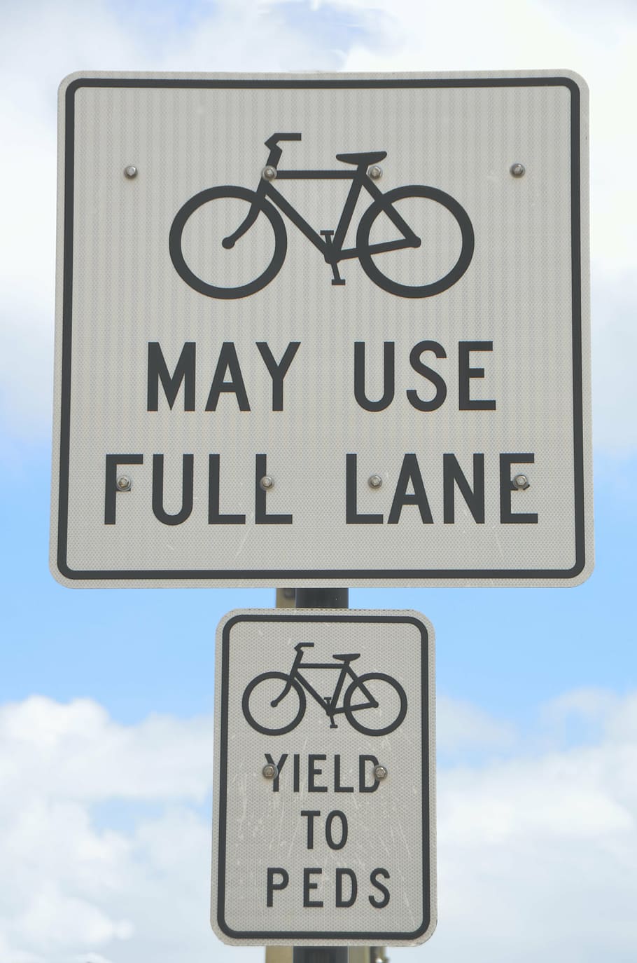 bike lane, sign, outdoors, signage, bicycle, road, transportation, traffic, symbol, safety