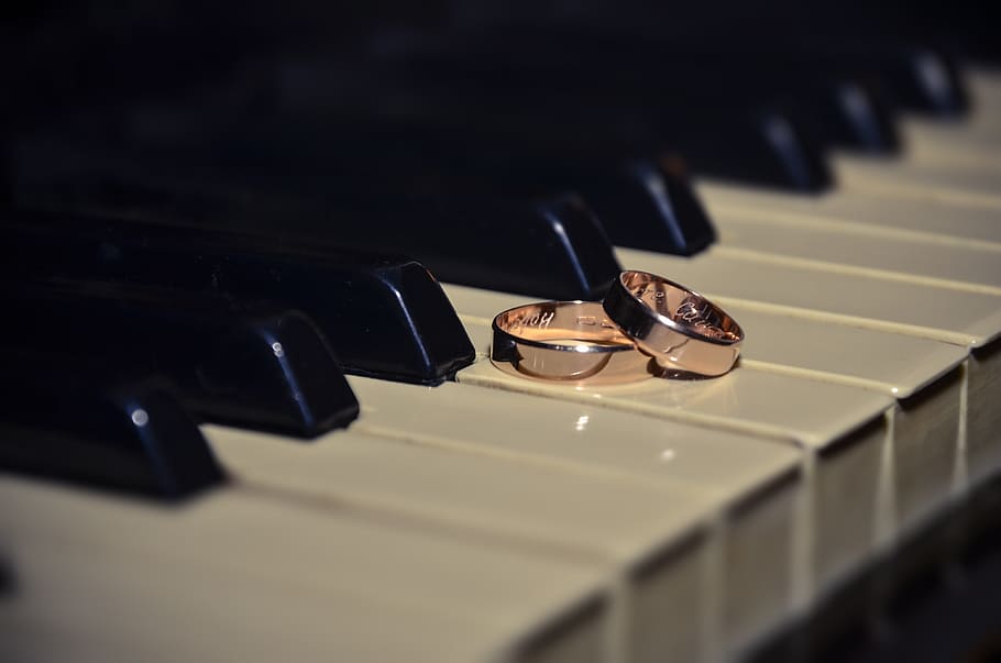 two, pink, gold-colored rings, placed, piano keys, pairs, gold ring, white, piano, ring