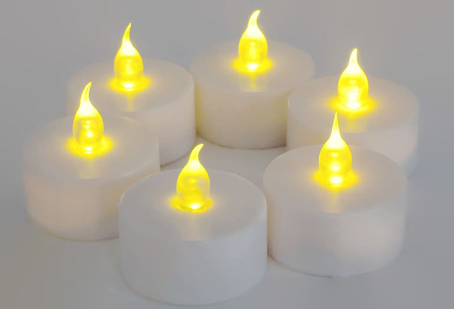 candles, battery operated, glow, illuminate, tea light, indoors, studio shot, close-up, candle, white color
