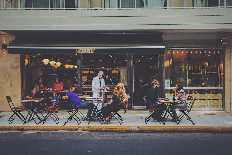 people, sitting, cafe front, table, setting, daytime, adult, al fresco, bar, city