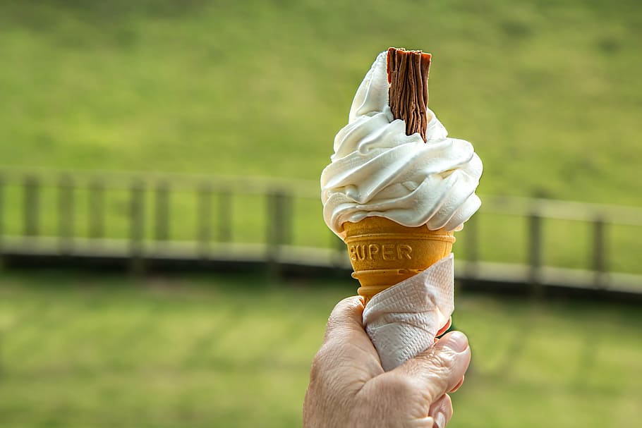 person, holding, brown, cone, daytime, melting, hot, ice cream scoop, temptation, ice-cream