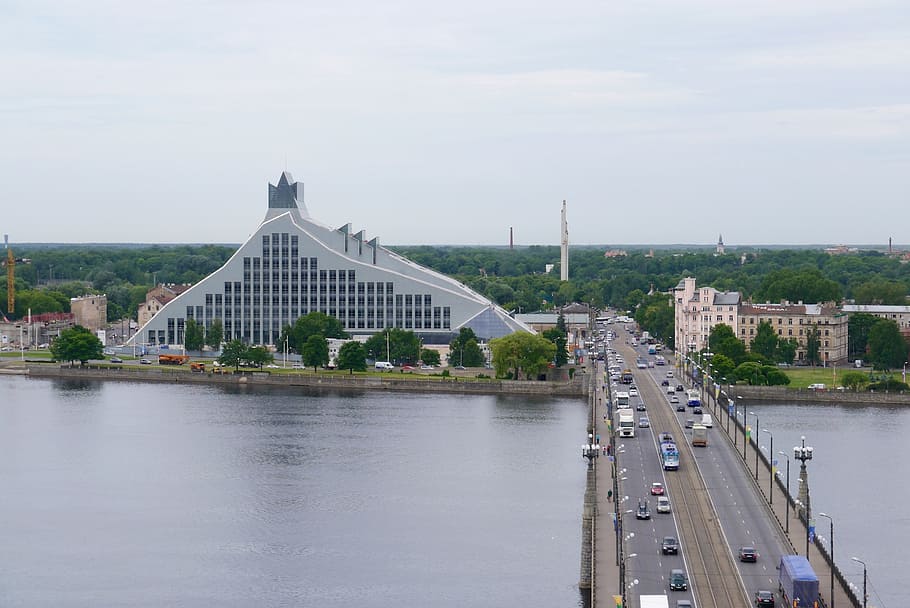 riga, latvia national library, stone bridge, built structure, architecture, water, building exterior, river, sky, connection