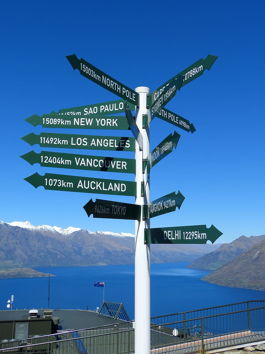 direction signage, pointer, lake wakatipu, queenstown, auckland, north pole, sao paulo, new york, vancouver, los angeles