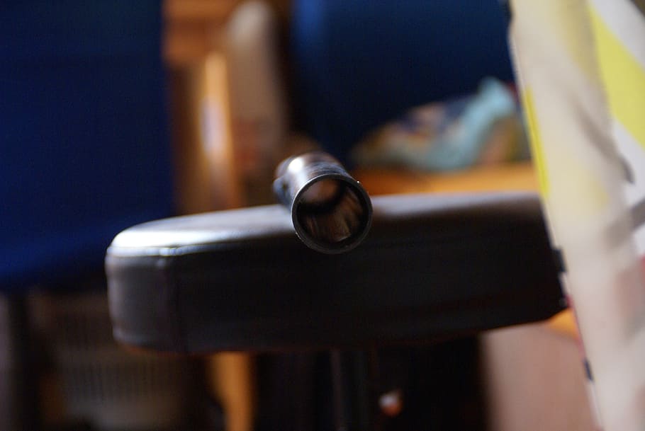 chair, detail, tube, vacuum cleaner, close-up, selective focus, focus on foreground, indoors, metal, still life