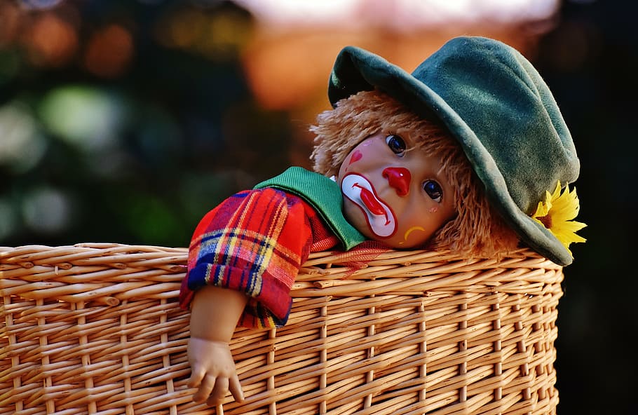 baby clown doll, basket, doll, clown, sad, colorful, sweet, funny, toys, children