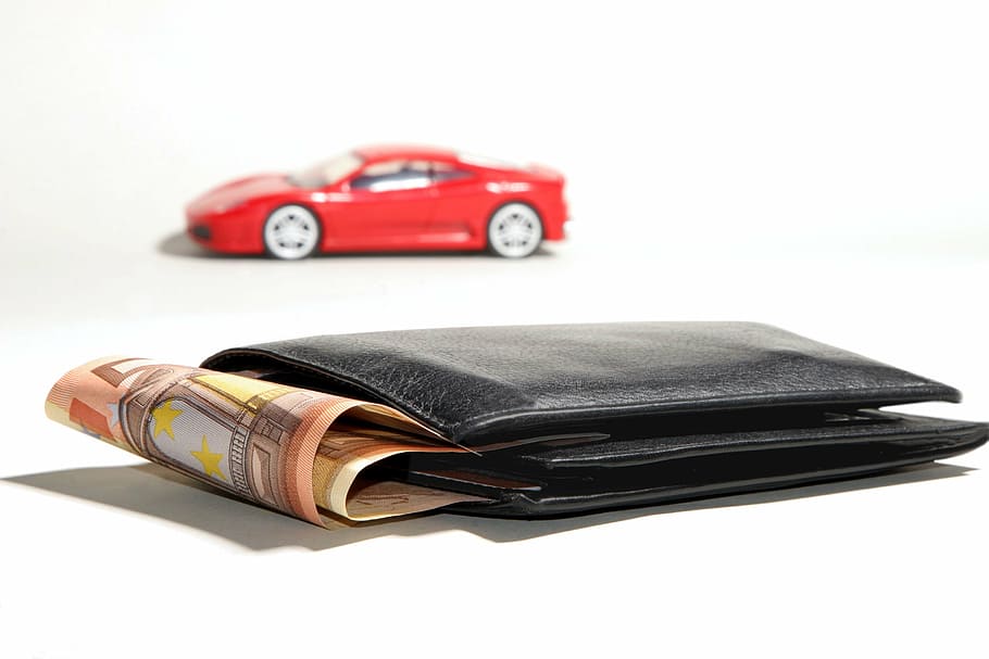 black, leather bi-fold wallet, banknotes, red, die-cast toy, auto financing, financing, interest, credit, money