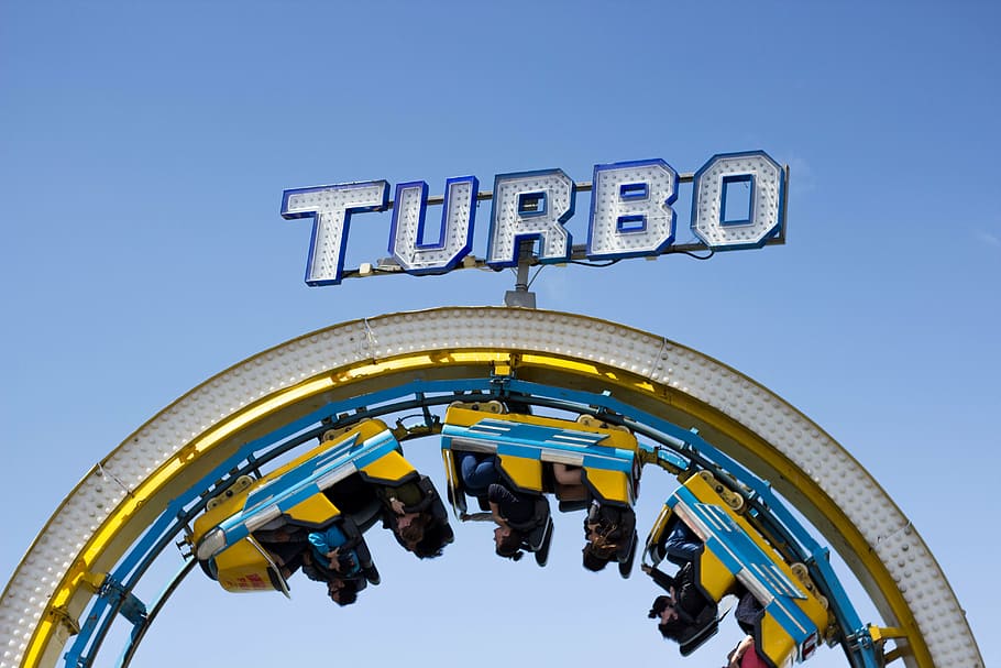 group, person, riding, turbo arcade machine, outdoors, turbo, roller, coaster, daytime, still
