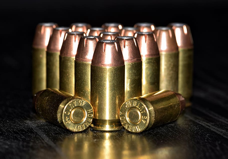 copper-colored bullet lot, bullets, ammo, ammunition, brass, cartridges, caliber, rounds, acp, hornady