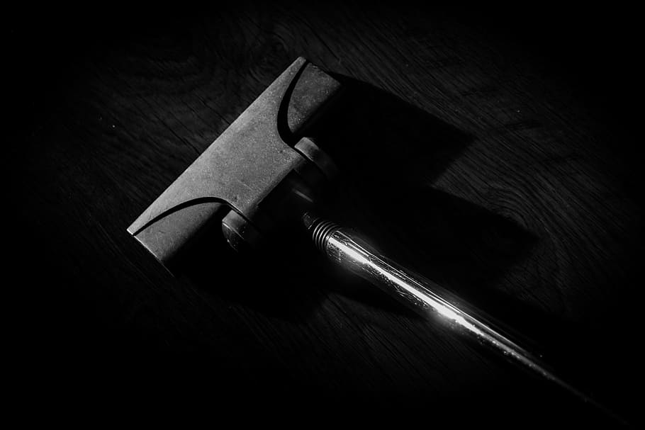 grayscale photography, pen, vacuum cleaner, vacuuming, cleaning, washing, cleanup, indoors, wood - material, weapon