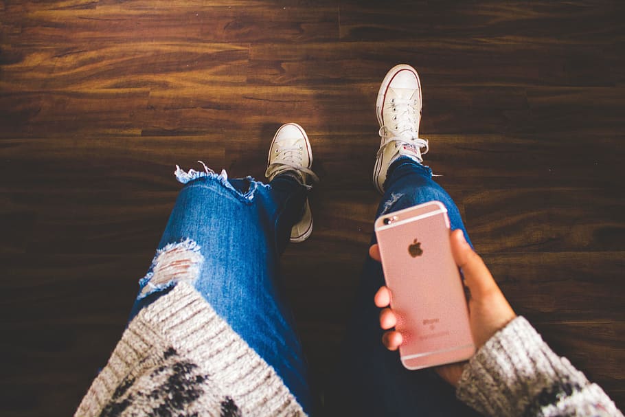 girl, wearing, jeans, looking, mobile, iphone smartphone, looking down, iPhone, smartphone, people