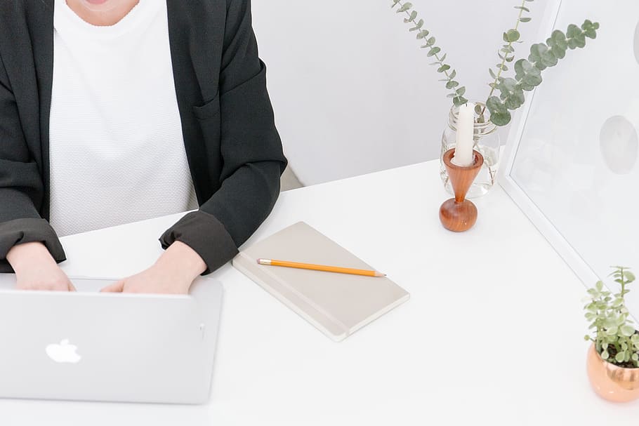 person, wearing, black, cardigan, working, typing, macbook, laptop, computer, technology