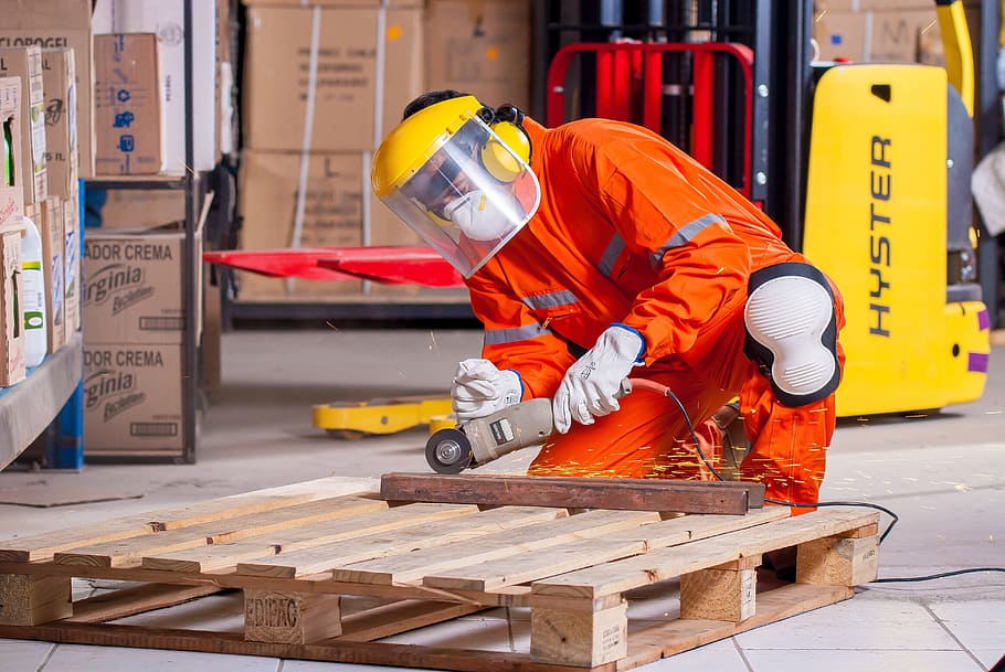 man, kneeling, holding, angle grinder, Industrial, Security, Logistic, work clothes, industrial safety, protective goggles