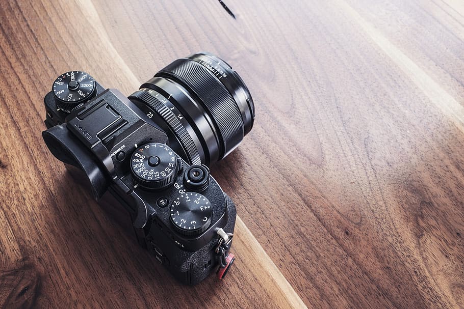 black, dslr camera, brown, wooden, table, wooden table, objects, lazy, photography, cameras