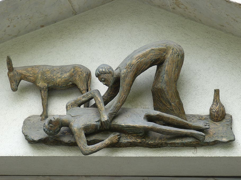 person, lifting, unconscious, ground, donkey figurine, donkey, figurine, good samaritan, samaritans, help