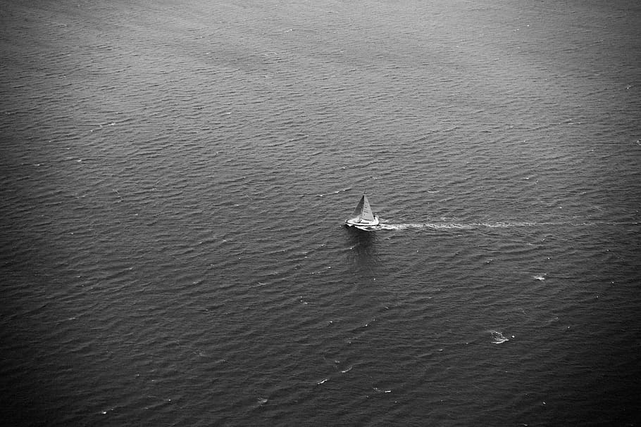 sailboat, sea, ocean, waves, water, black and white, nautical vessel, transportation, mode of transportation, high angle view