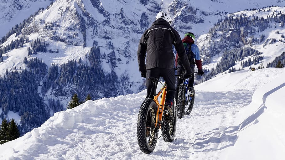 man, riding, yellow, fat, bike, snow-covered, road, snow, winter, mountain