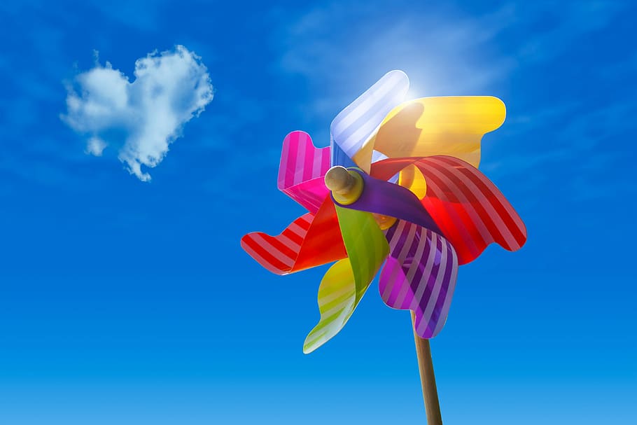 windmill fan, daytime, pinwheel, sky, clouds, sun, wind, blue, toys, heart