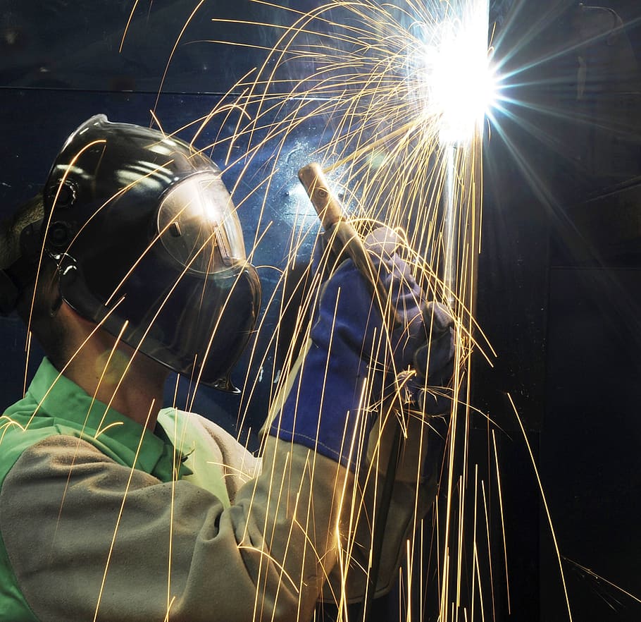 person performing welding, charleston, south carolina, worker, weld, welding, welder, fixing, repairing, sparks