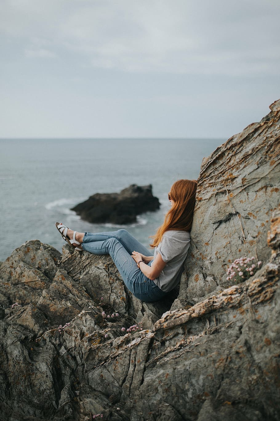 woman, sitting, gray, rock, fronting, body, water, sea, ocean, waves
