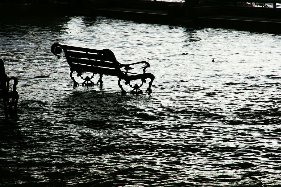 black, metal park bench, middle, body, water, flood, seat, chair, bench, flooding