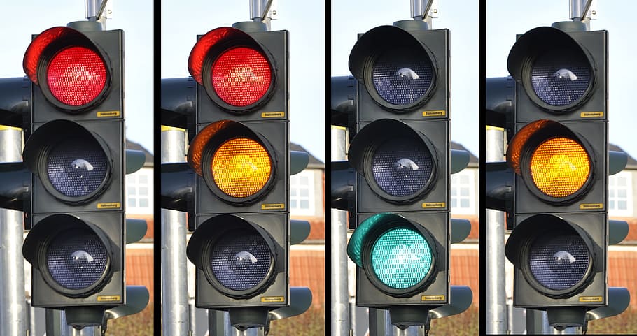 four, turned-on traffic lights, traffic light, signal, traffic, street, road, sign, safety, stoplight