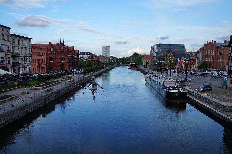 boat on river, bydgoszcz, poland, tightrope walker, building exterior, architecture, built structure, water, city, sky