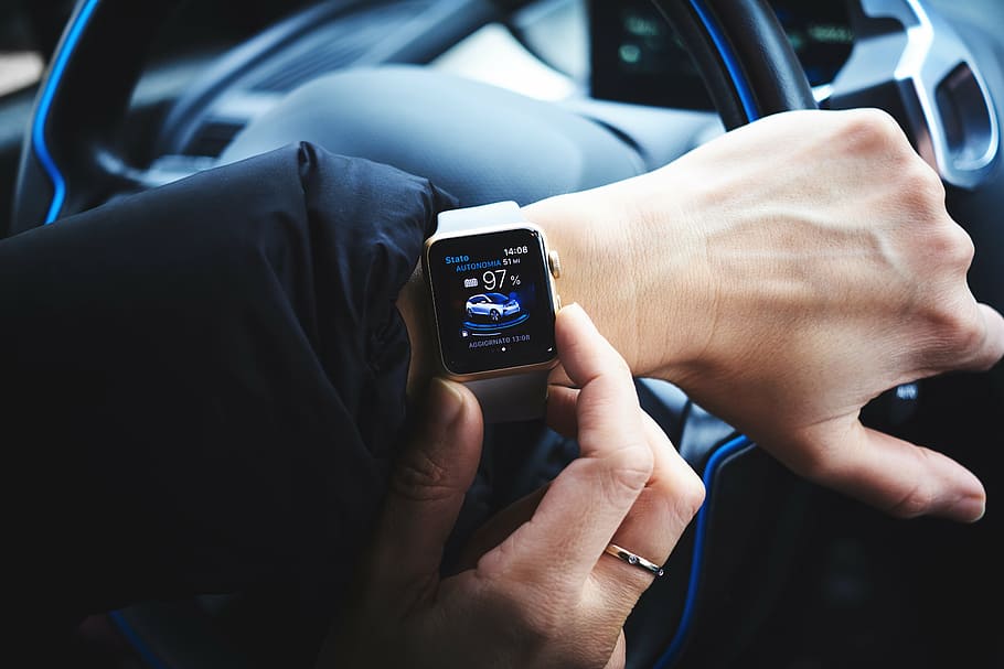 person, wearing, turned-on apple, watch, inside, vehicle, people, hand, time, technology