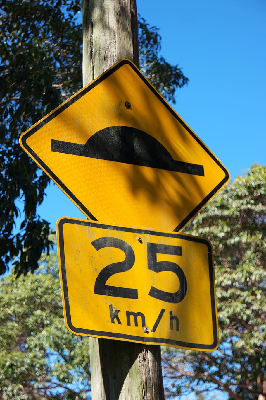 sign, road, road signs, post, symbol, warning, traffic, street, signpost, road hump