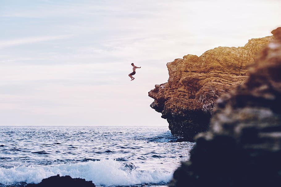 man, cliff dive, jumped, shore, wide, body, water, sea, ocean, waves