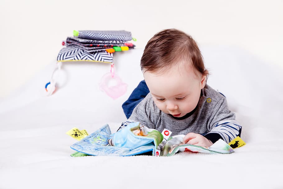 baby playing canvas, child, baby, education, toy, son, fun, booklet, touch, stimulation of view