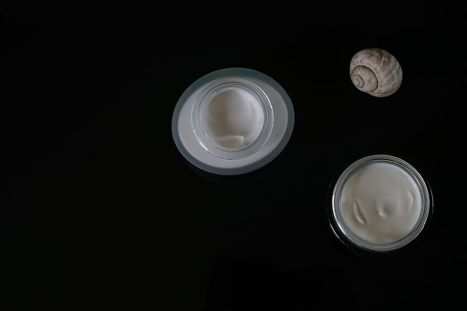 cosmetics, face cream, creams, shell of a snail, skin care, makeup, beauty, black background, lay flat, studio shot