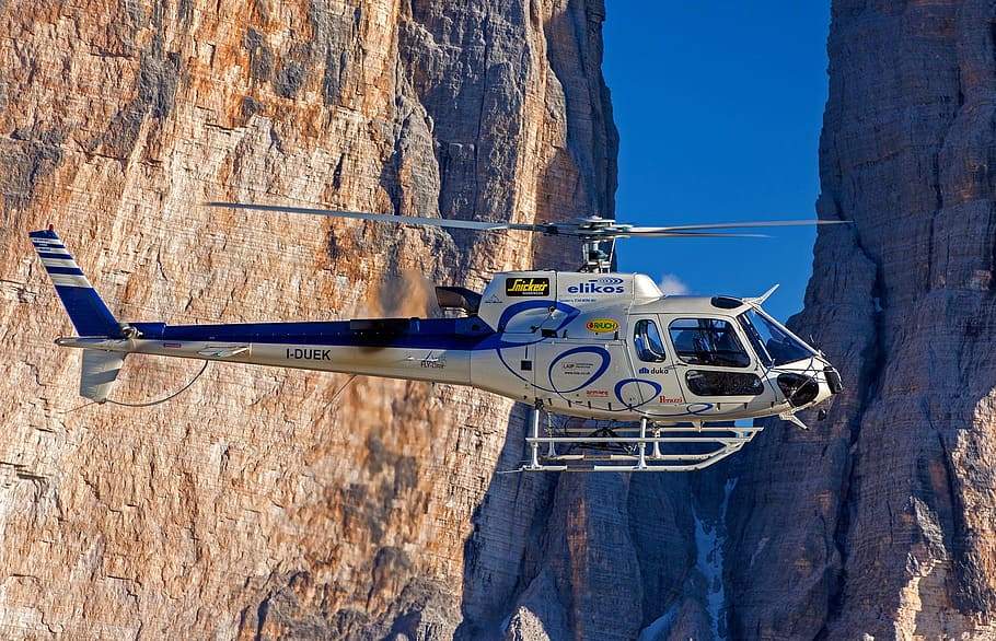 white, blue, helicopter, flies, brown, rock formation, elikos, south tyrol, three zinnen, dolomites