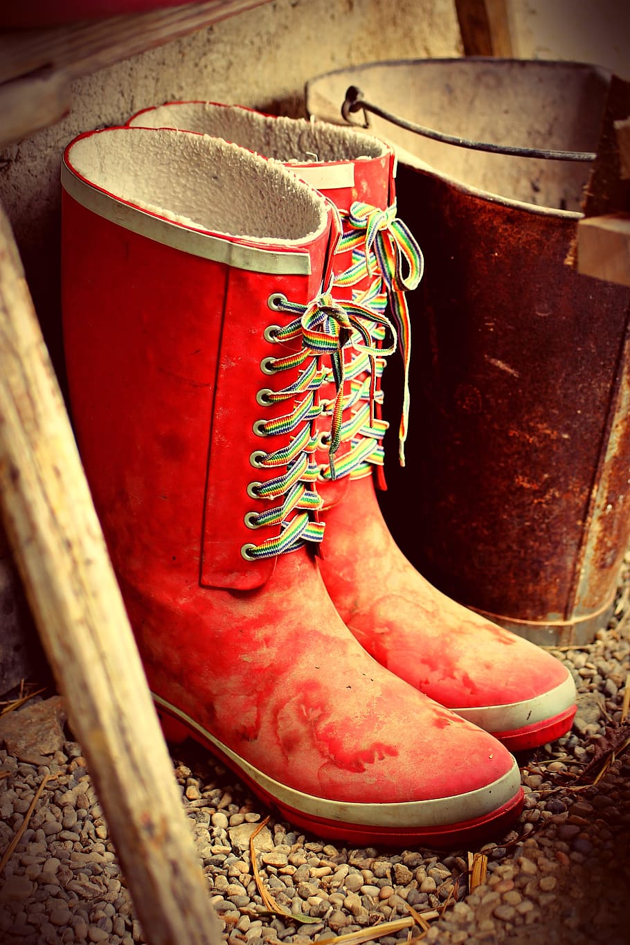 rustic, village life, bad weather, boots, wellingtons, red, color, bucket, yard, farm