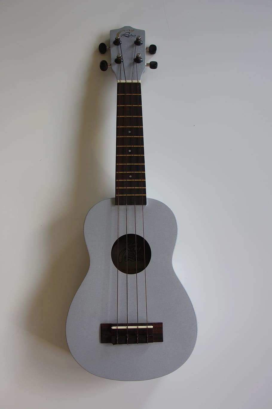 gray ukulele, ukulele, instrument, music, pages, musical instrument, soundbody, grey, string instrument, guitar